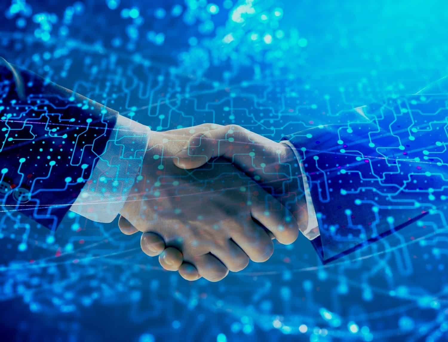 A handshake representing a Banyan Technology partnership