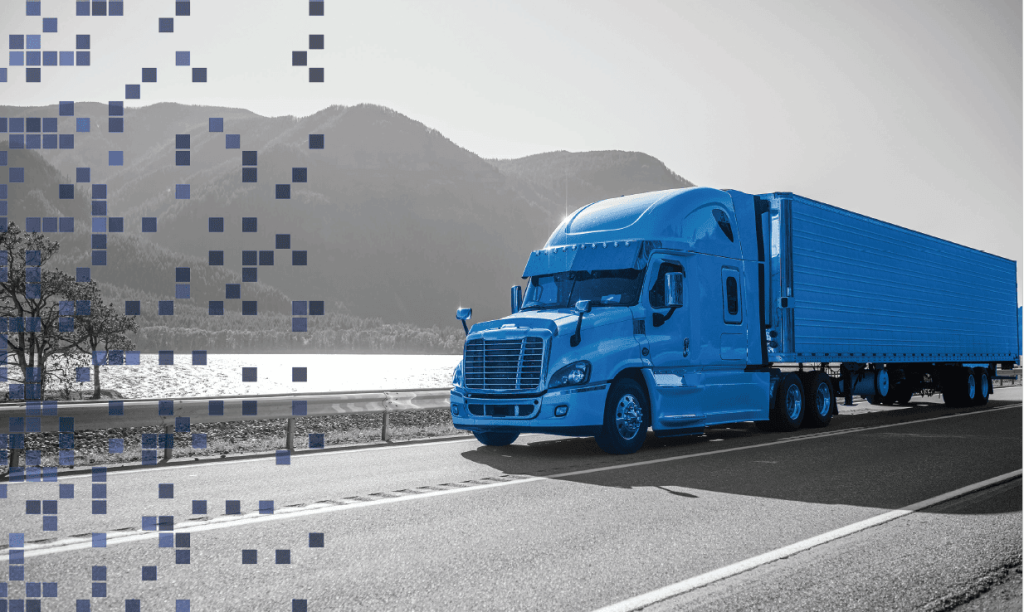 Blue semi-truck on highway near mountains, transportation logistics, freight shipping, trucking industry, Banyan Technology.