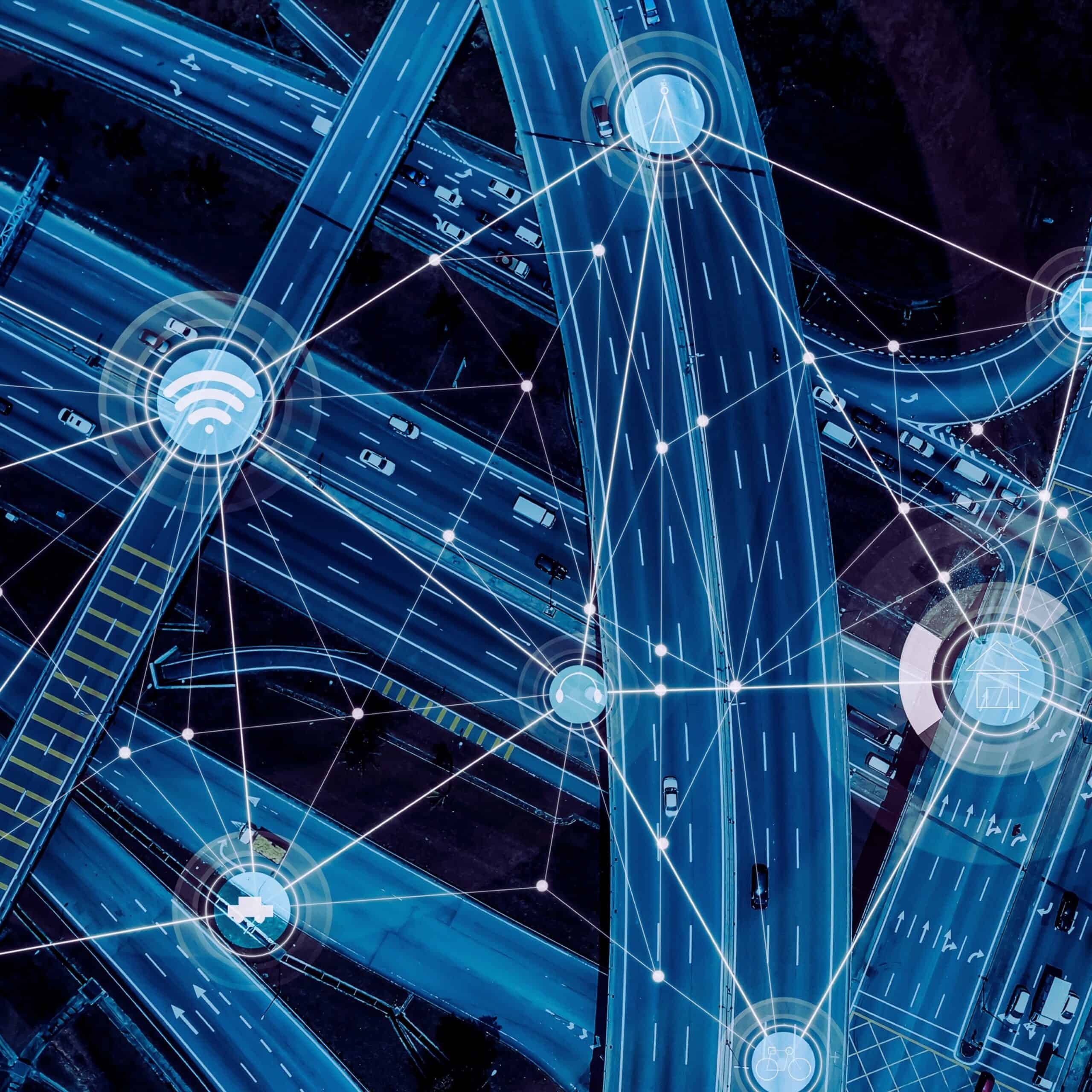 Aerial view of a highway featuring digital tracking technology