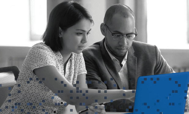 Flexible team collaborating on technology solutions at Banyan Technology, demonstrating innovation and customer-focused IT services.