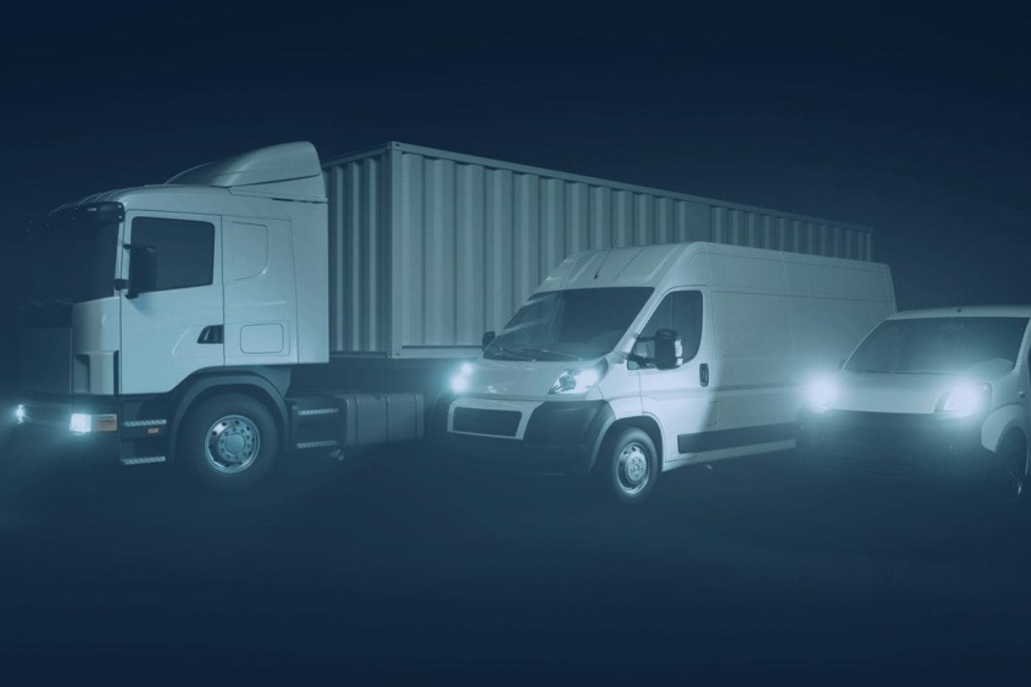 Multi-mode OTR shipping vehicles parked next to each other