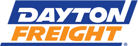 Alt text: Modern warehouse with advanced logistics technology and trucks for efficient freight management by Banyan Technology.