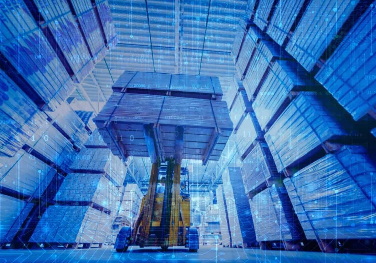 A forklift carrying pallets of goods in a large warehouse
