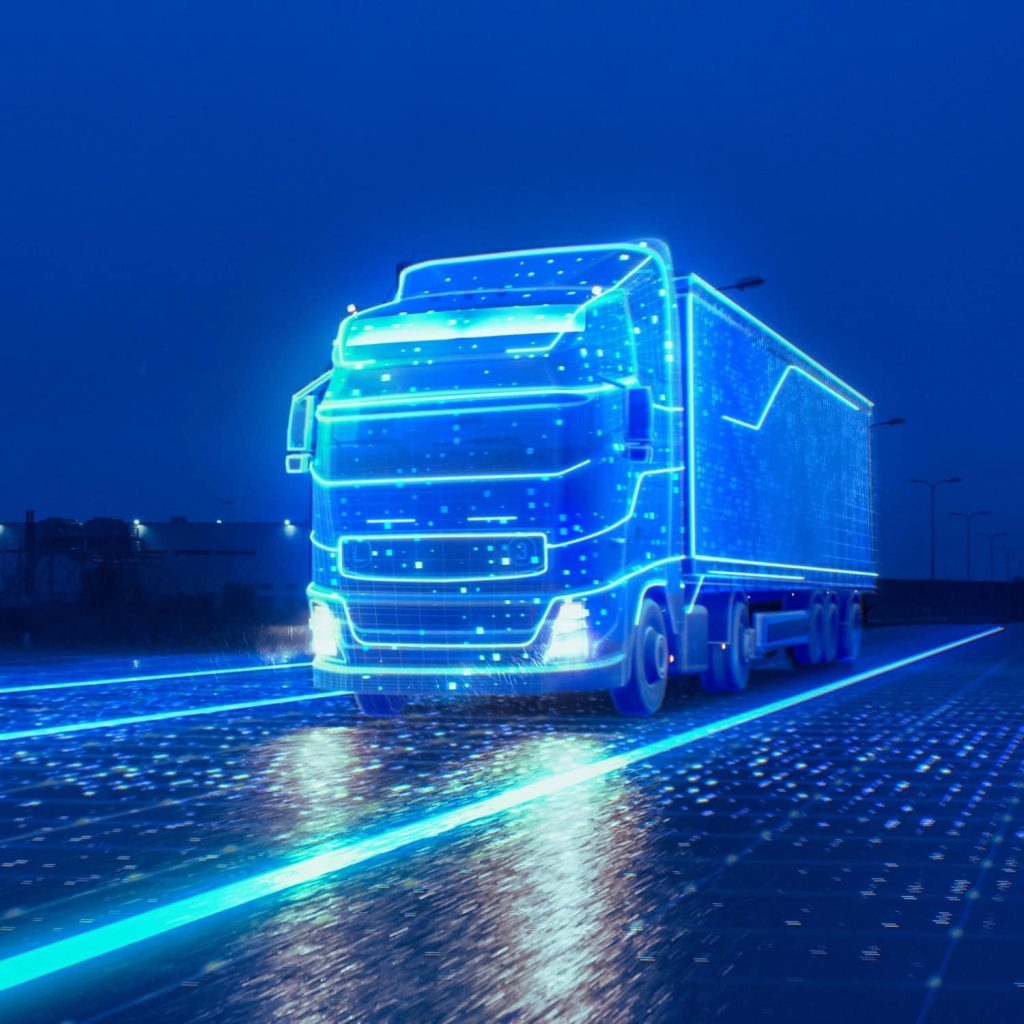 Futuristic digital truck with glowing blue wireframe design representing innovative logistics technology.